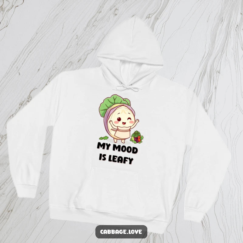 Funny hoodie featuring a round cabbage character in an apron, happily tossing a salad.